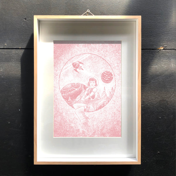 Example of the Space Cadet artwork framed on wall.